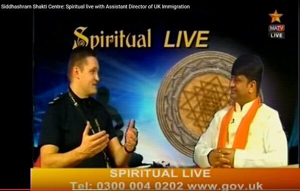 Immigration Assistant Director -Home Office  Mr.  Richard Lederle explains the measures on TV show with HH Shri Rajrajeshwar Guruji.