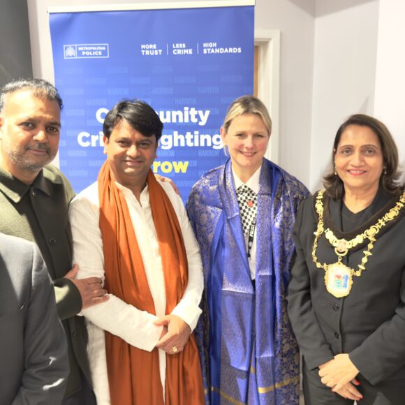 Shri Rajrajeshwar Guruji and Mr. Taz Khan honored Assistant Commissioner Williams.