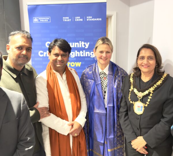 Shri Rajrajeshwar Guruji and Mr. Taz Khan honored Assistant Commissioner Williams.