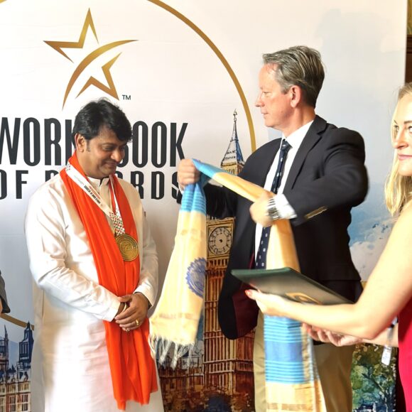 10th Summit of WBR, where HH Shri R Guruji was honoured by Shadow Minister Gareth Bacon MP at the British Parliament.
