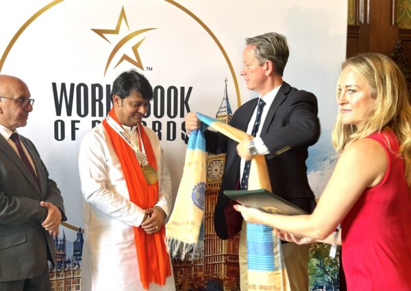 10th Summit of WBR, where HH Shri R Guruji was honoured by Shadow Minister Gareth Bacon MP at the British Parliament.