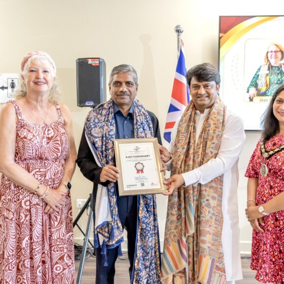Mr. Ajay Choudhry, IPS, Joint Commissioner of Police in New Delhi, was honored with an award by HH R Guruji London.