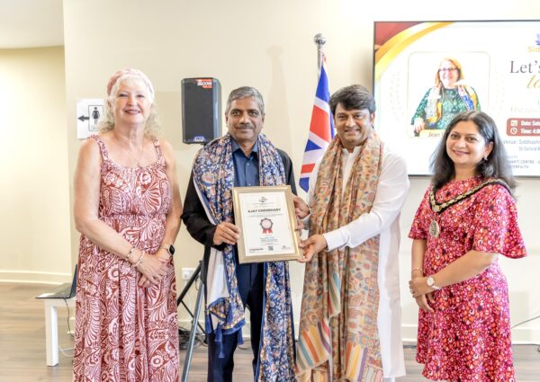 Mr. Ajay Choudhry, IPS, Joint Commissioner of Police in New Delhi, was honored with an award by HH R Guruji London.