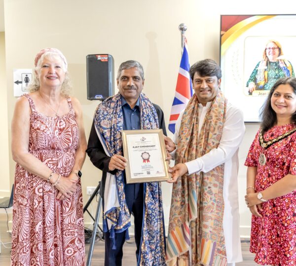 Mr. Ajay Choudhry, IPS, Joint Commissioner of Police in New Delhi, was honored with an award by HH R Guruji London.
